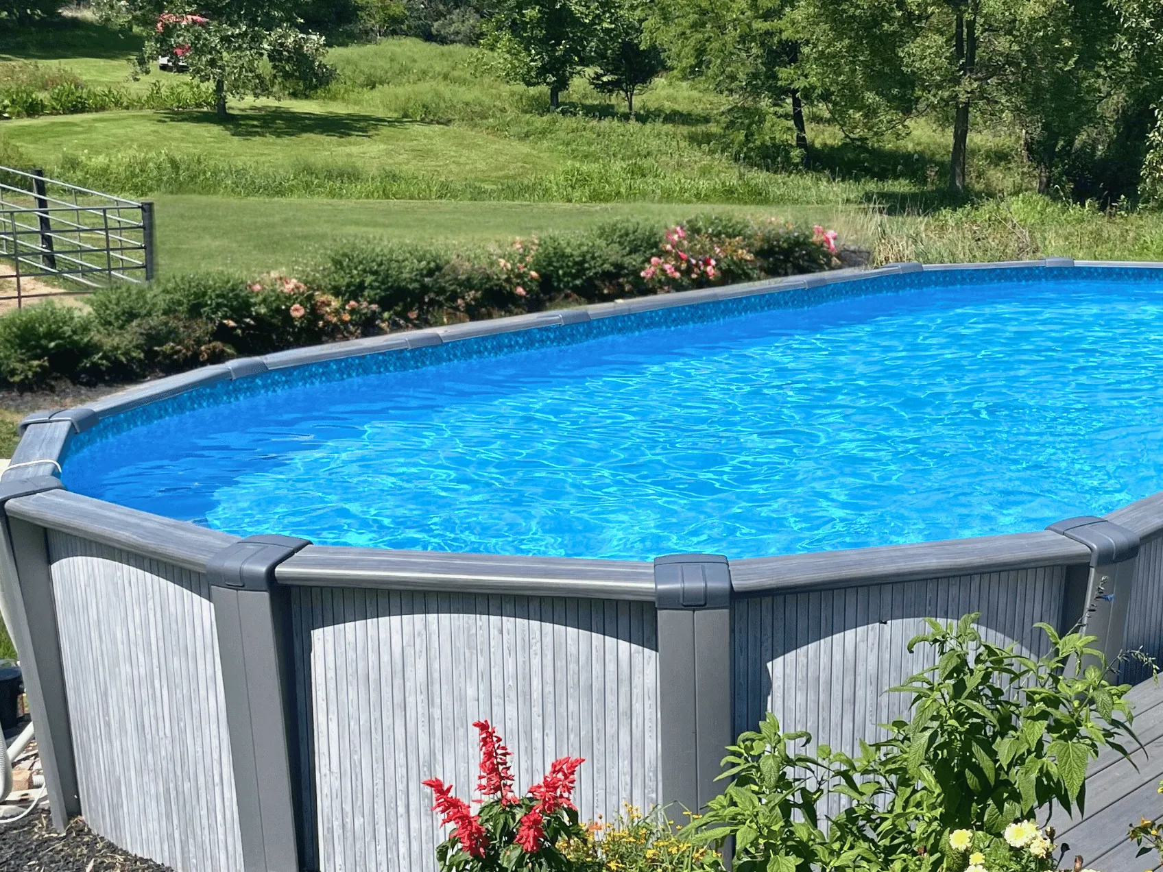 Bahama oval overlap pool liner in a Tribeca oval pool