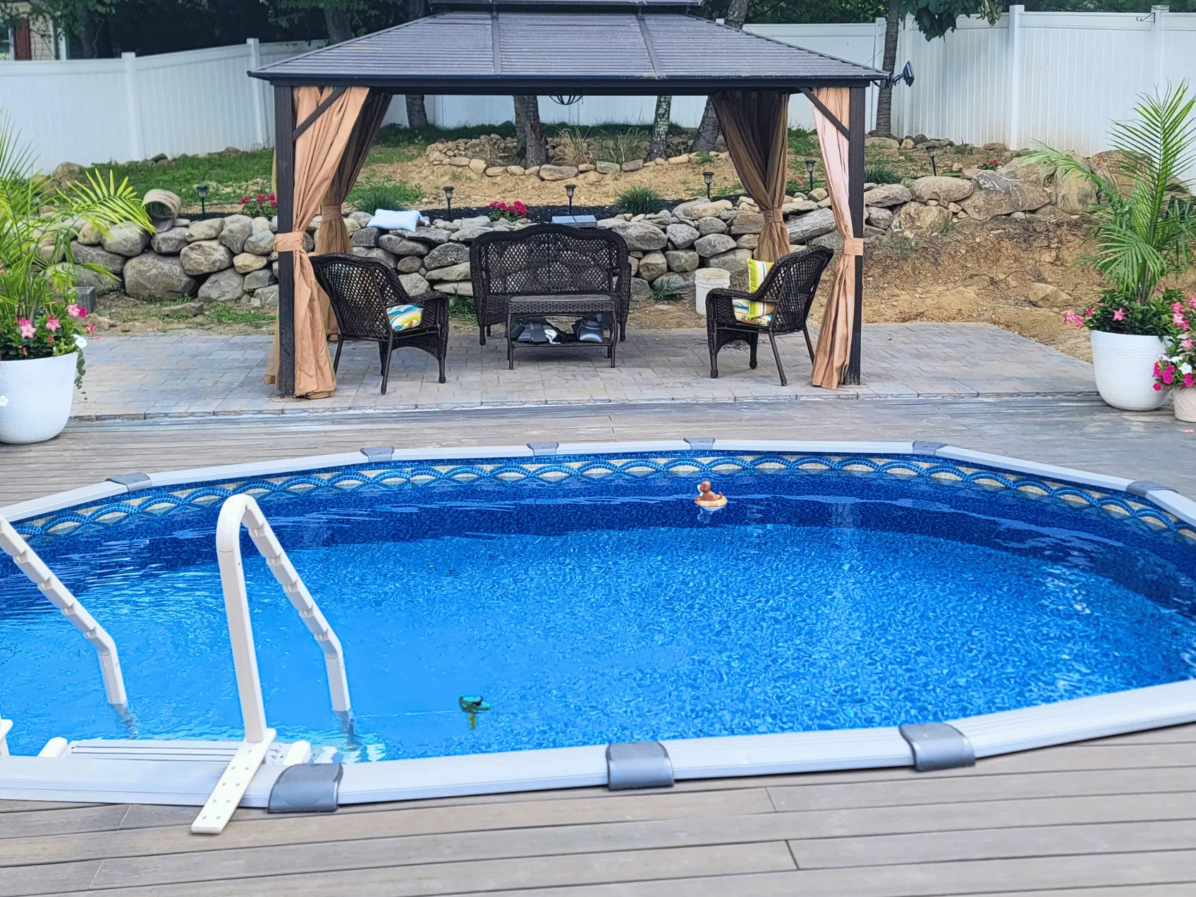 Catalina oval uni-bead pool liner in a Boreal oval pool
