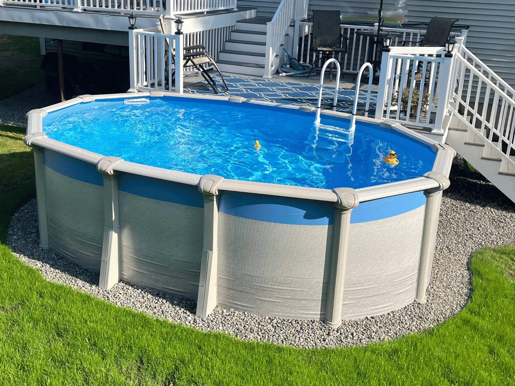 Blue oval overlap pool liner in a Signature RTL oval pool
