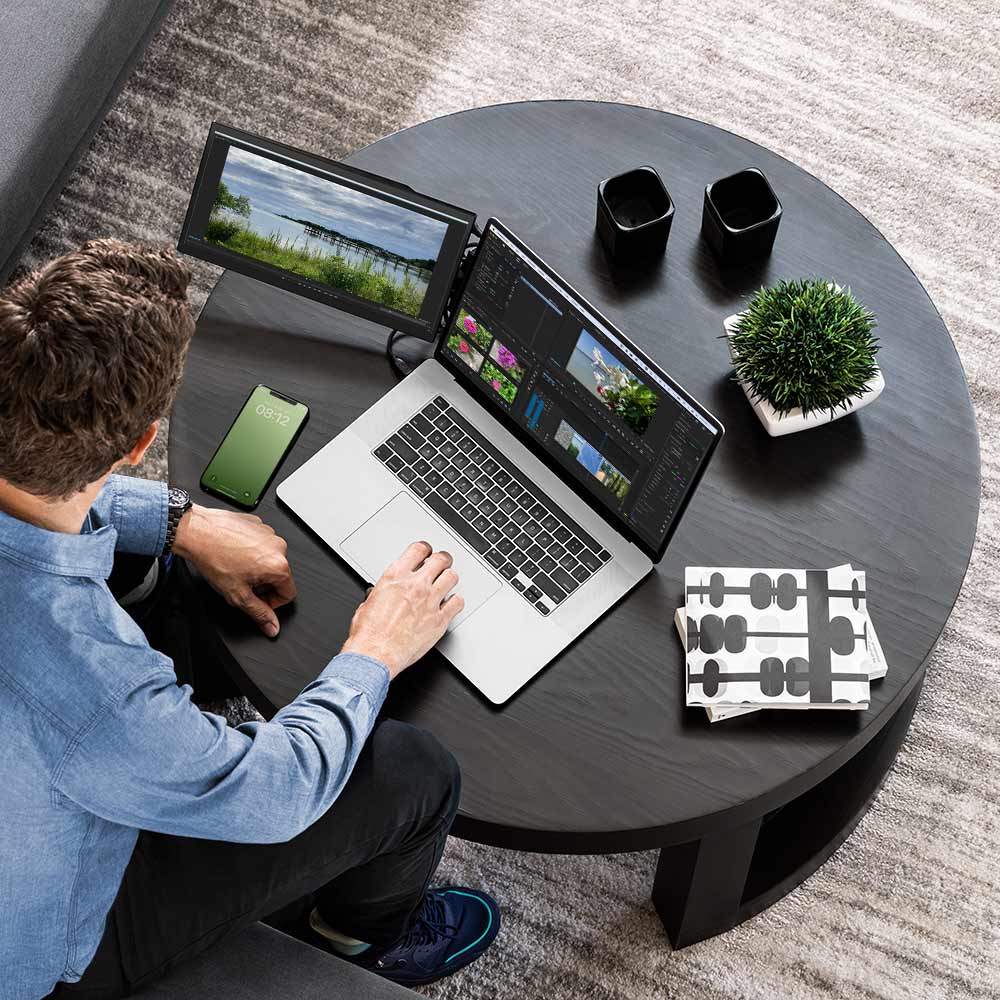 photo featuring the Swivel Pro portable attachable monitor's ability to be taken anywhere