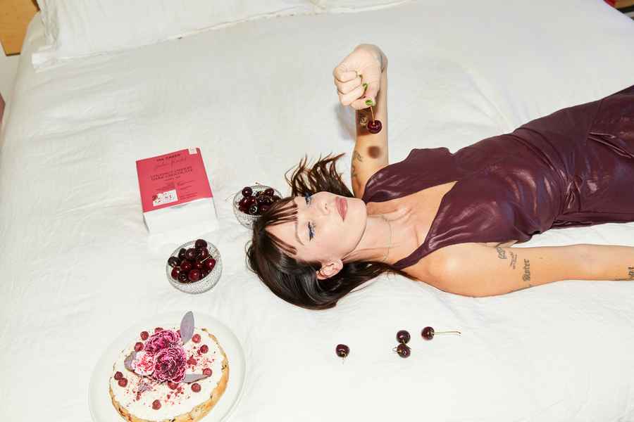 Cherry Coconut Dark Chocolate Cake KitEditorial Image of person making cake