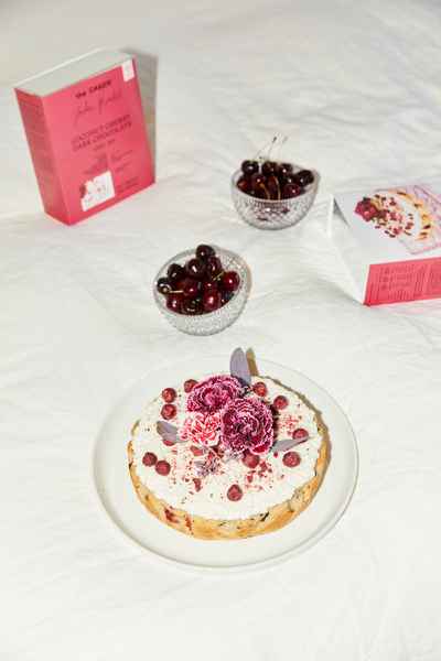 Cherry Coconut Dark Chocolate Cake KitEditorial Image of person making cake