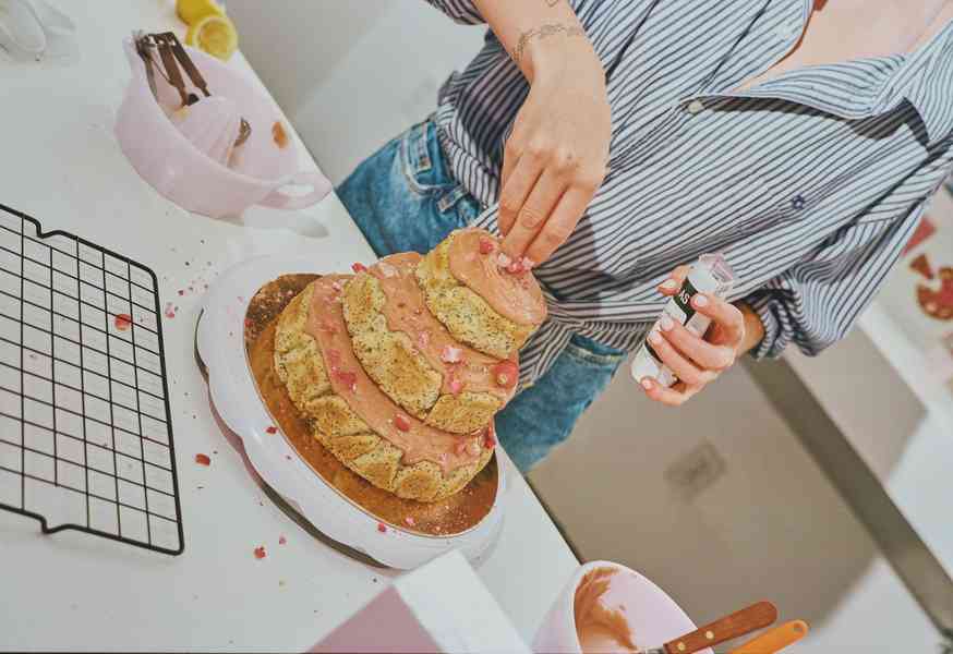 3-Tiered Cake KitEditorial Image  of person making cake