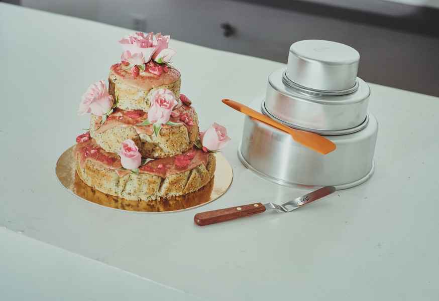 3-Tiered Cake KitEditorial Image of person making cake