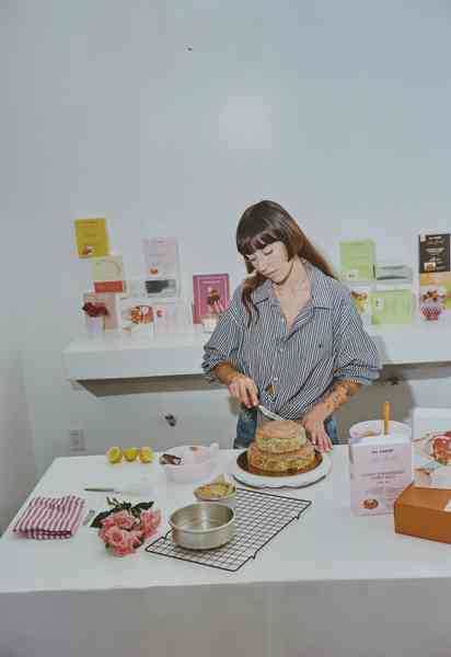 3-Tiered Cake KitEditorial Image  of person making cake