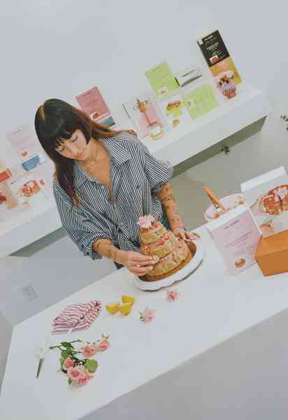 3-Tiered Cake KitEditorial Image  of person making cake