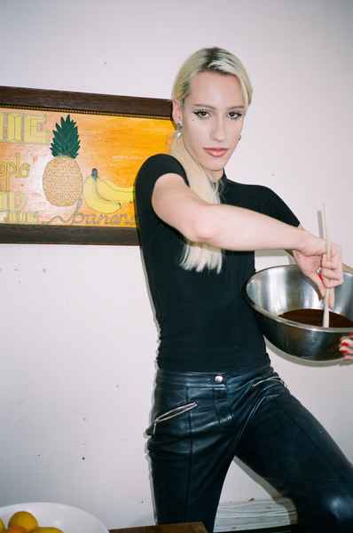 Flourless Dark Chocolate Gold Leaf Cake KitEditorial Image of person making cake