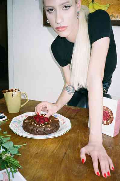 Flourless Dark Chocolate Gold Leaf Cake KitEditorial Image  of person making cake