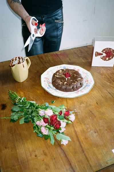 Flourless Dark Chocolate Gold Leaf Cake KitEditorial Image of person making cake