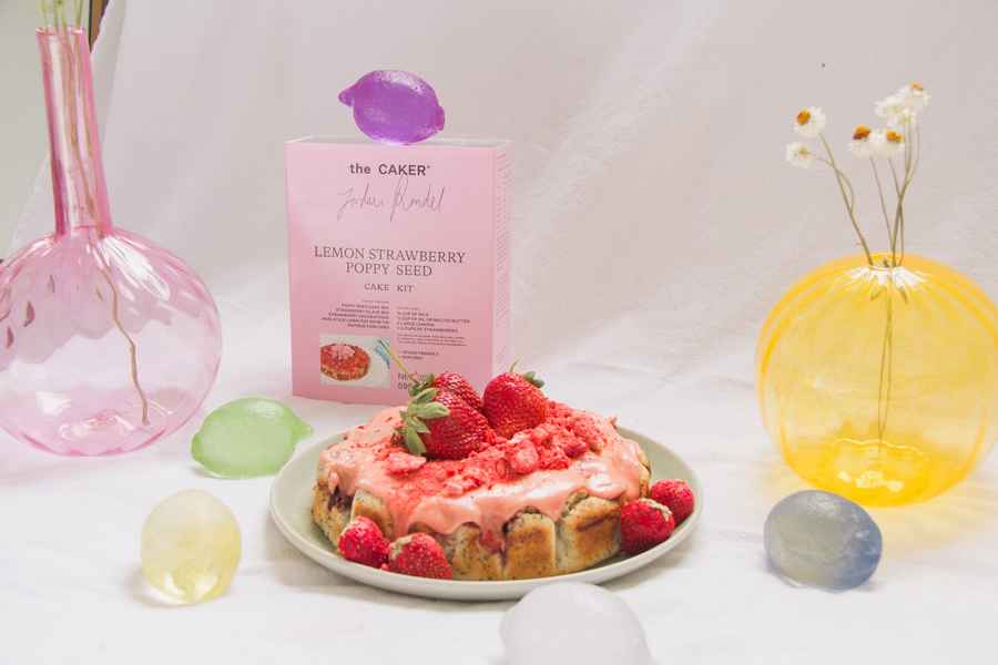 Lemon Strawberry Poppy Seed Cake KitEditorial Image of person making cake