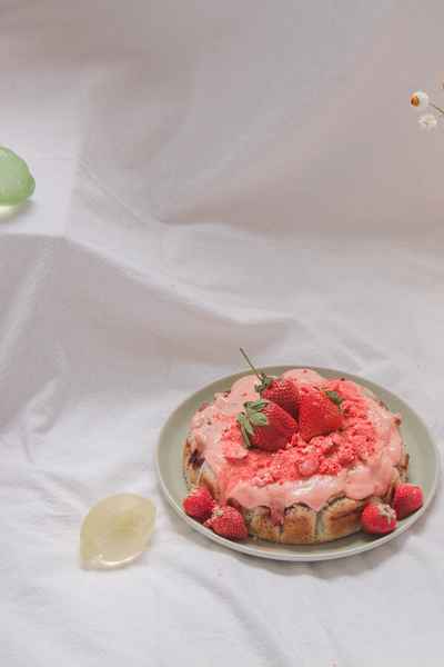 Lemon Strawberry Poppy Seed Cake KitEditorial Image of person making cake