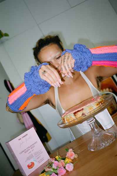 Lemon Strawberry Poppy Seed Cake KitEditorial Image of person making cake