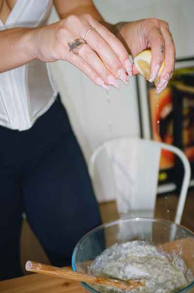 Lemon Strawberry Poppy Seed Cake KitEditorial Image of person making cake