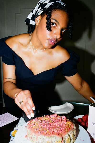 Lemon Strawberry Poppy Seed Cake KitEditorial Image of person making cake