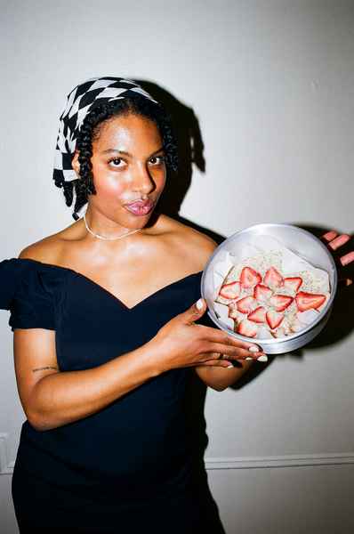 Lemon Strawberry Poppy Seed Cake KitEditorial Image of person making cake