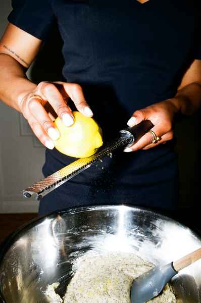 Lemon Strawberry Poppy Seed Cake KitEditorial Image of person making cake