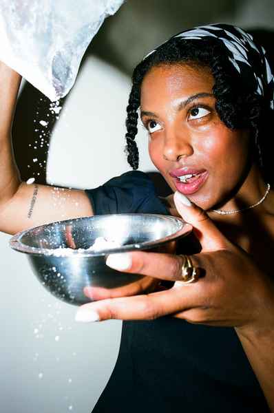 Lemon Strawberry Poppy Seed Cake KitEditorial Image of person making cake
