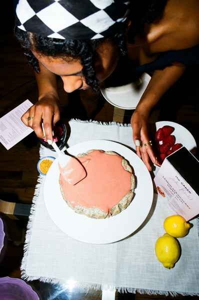Lemon Strawberry Poppy Seed Cake KitEditorial Image of person making cake