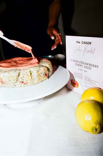 Lemon Strawberry Poppy Seed Cake KitEditorial Image of person making cake