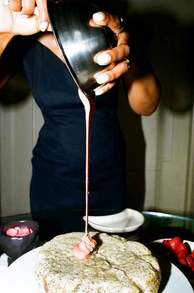 Lemon Strawberry Poppy Seed Cake KitEditorial Image of person making cake