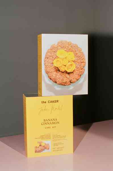WHOLESALE Banana Cinnamon Cake Kit - (6 Unit Case)Editorial Image  of person making cake