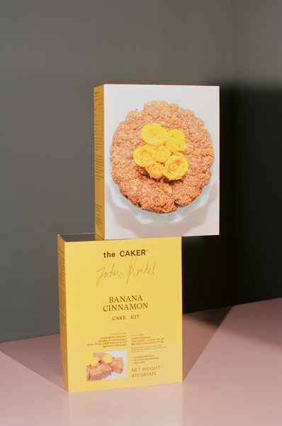 WHOLESALE Banana Cinnamon Cake Kit - (6 Unit Case)Editorial Image of person making cake