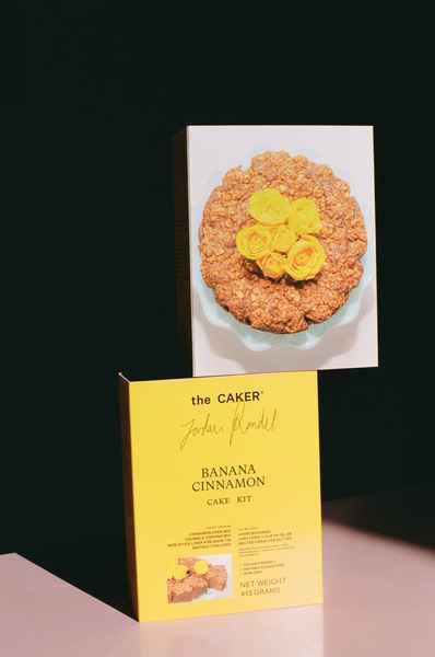 WHOLESALE Banana Cinnamon Cake Kit - (6 Unit Case)Editorial Image of person making cake