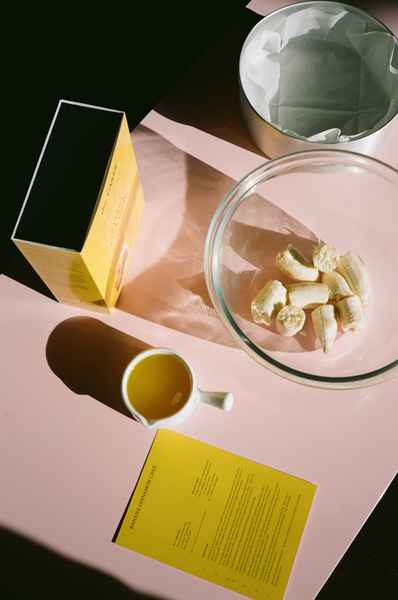 WHOLESALE Banana Cinnamon Cake Kit - (6 Unit Case)Editorial Image of person making cake