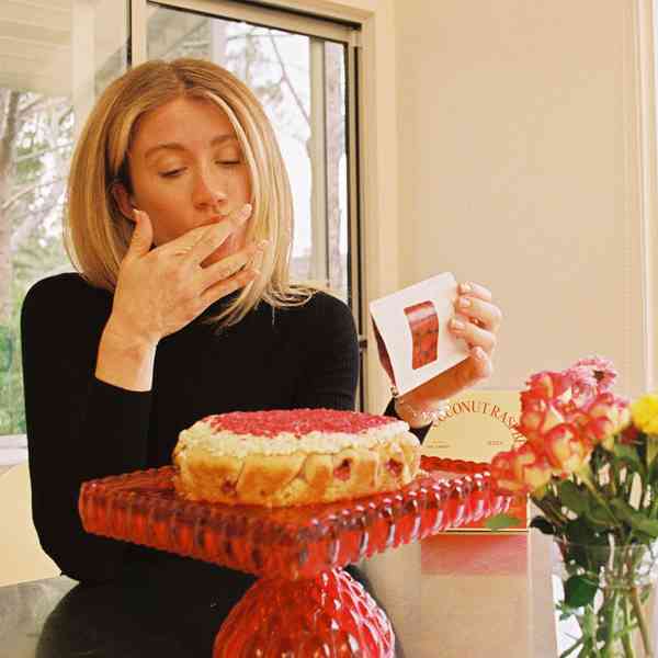 Coconut Raspberry Lime Leaf Cake KitEditorial Image  of person making cake