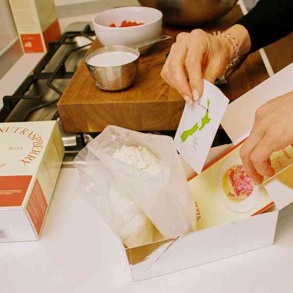 Coconut Raspberry Lime Leaf Cake KitEditorial Image  of person making cake