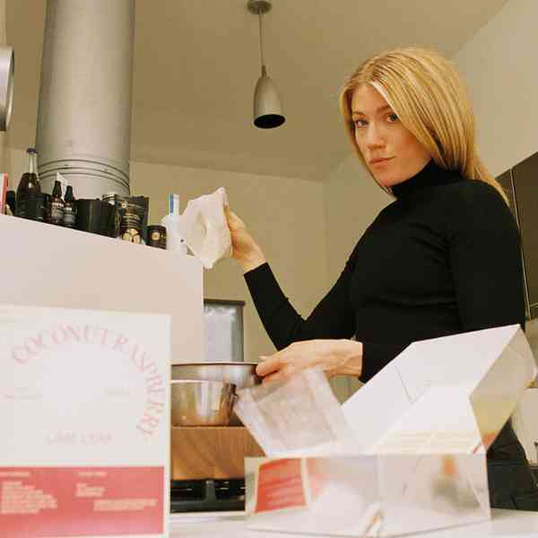 Coconut Raspberry Lime Leaf Cake KitEditorial Image  of person making cake