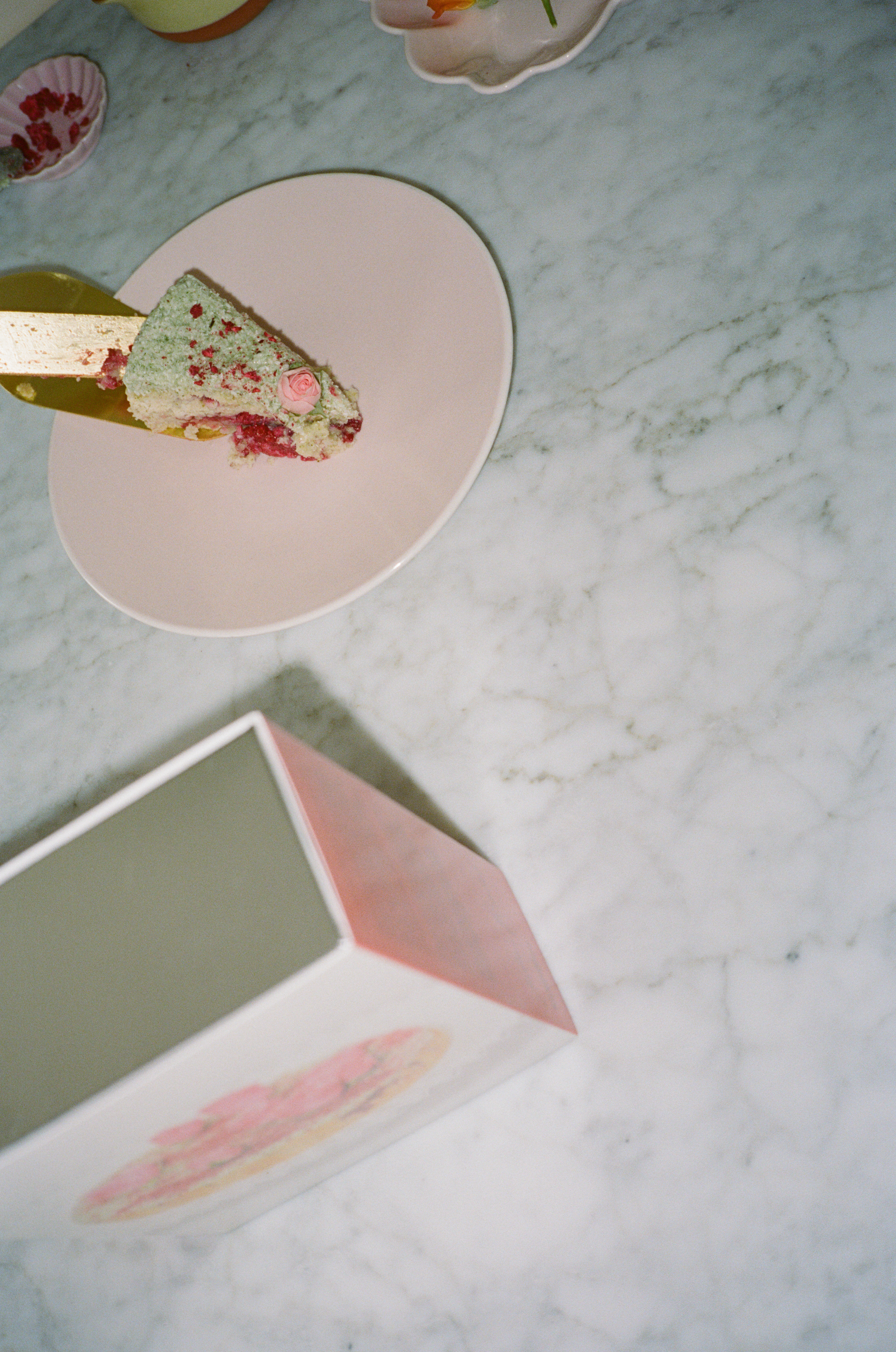 Coconut Raspberry Lime Leaf Cake KitEditorial Image of person making cake