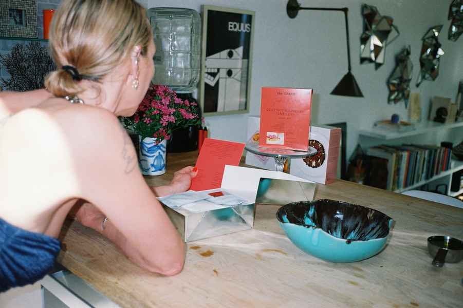 Coconut Raspberry Lime Leaf Cake KitEditorial Image of person making cake