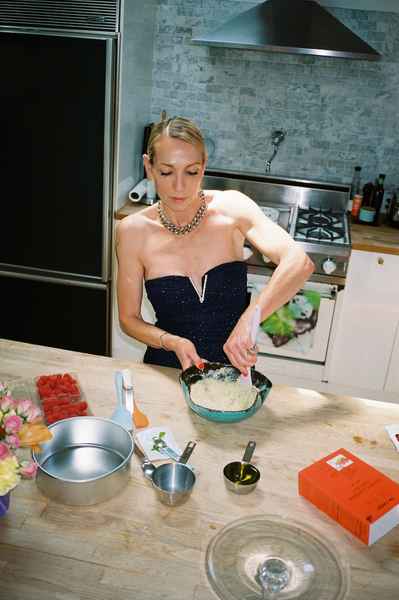 Coconut Raspberry Lime Leaf Cake KitEditorial Image of person making cake