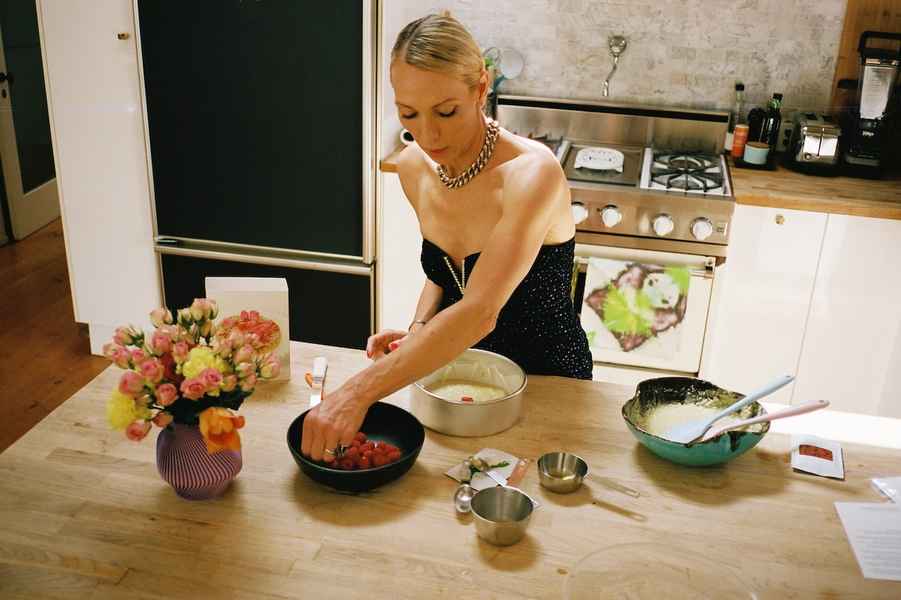 Coconut Raspberry Lime Leaf Cake KitEditorial Image of person making cake