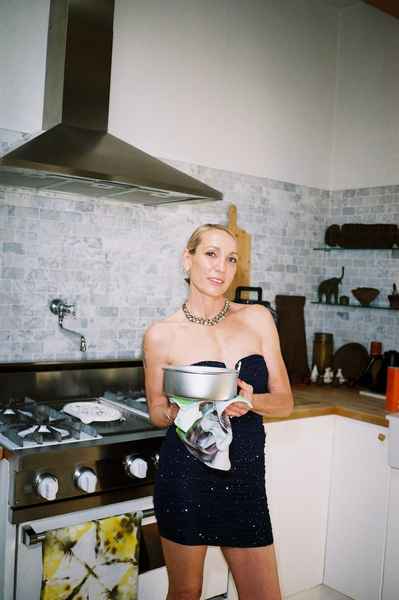 Coconut Raspberry Lime Leaf Cake KitEditorial Image of person making cake