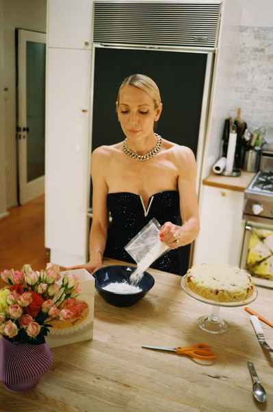 Coconut Raspberry Lime Leaf Cake KitEditorial Image of person making cake