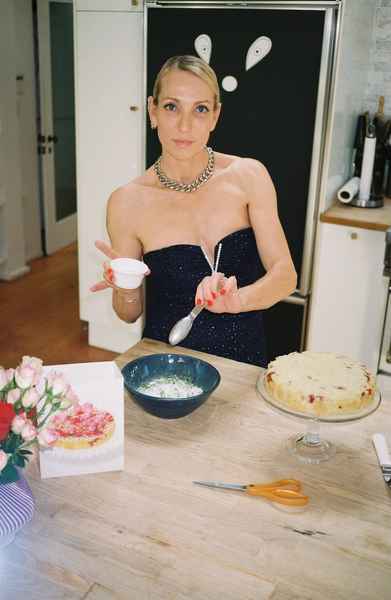 Coconut Raspberry Lime Leaf Cake KitEditorial Image of person making cake