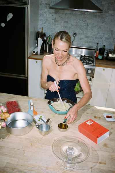 Coconut Raspberry Lime Leaf Cake KitEditorial Image of person making cake