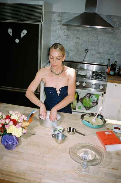 Coconut Raspberry Lime Leaf Cake KitEditorial Image of person making cake