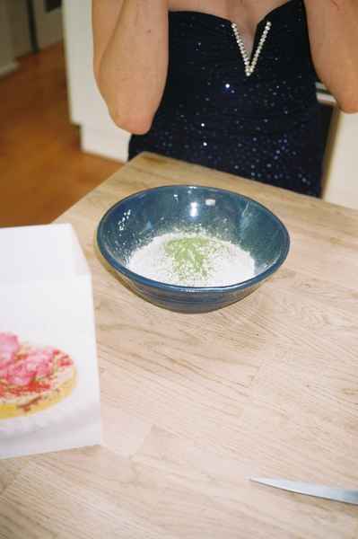 Coconut Raspberry Lime Leaf Cake KitEditorial Image of person making cake
