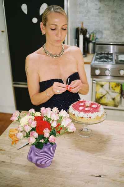 Coconut Raspberry Lime Leaf Cake KitEditorial Image of person making cake