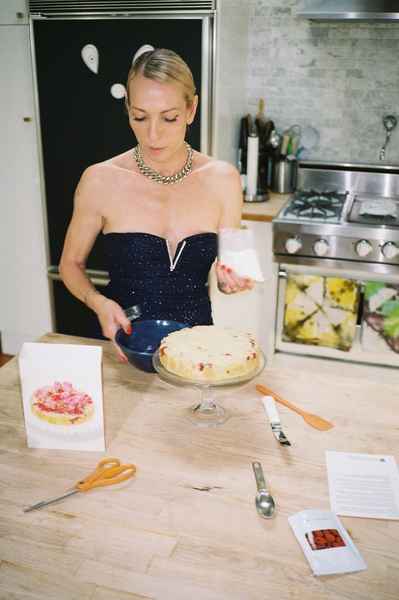 Coconut Raspberry Lime Leaf Cake KitEditorial Image of person making cake