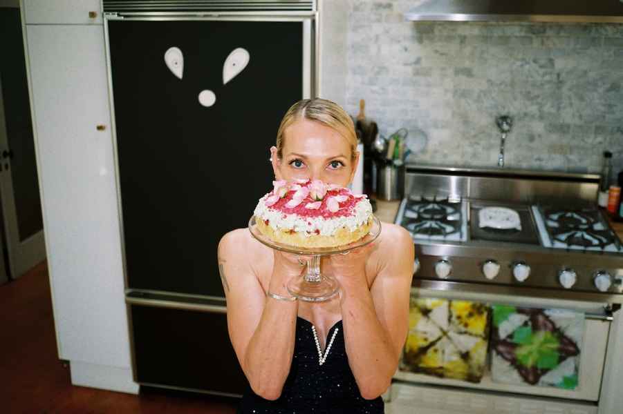 Coconut Raspberry Lime Leaf Cake KitEditorial Image of person making cake