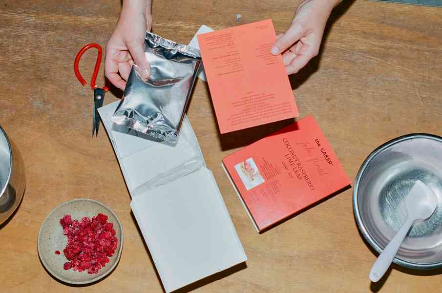 Coconut Raspberry Lime Leaf Cake KitEditorial Image  of person making cake