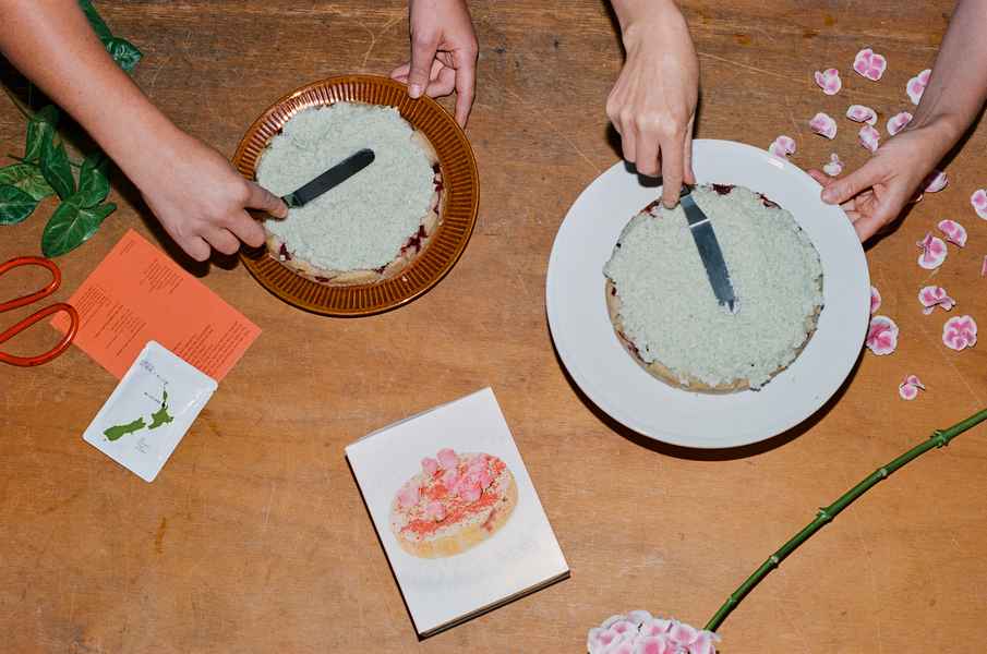 Coconut Raspberry Lime Leaf Cake KitEditorial Image of person making cake