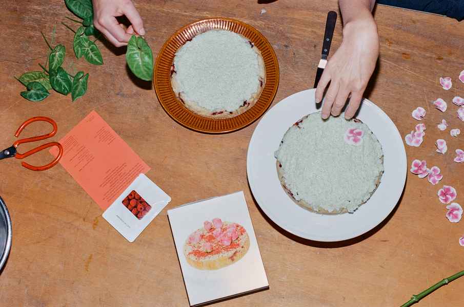 Coconut Raspberry Lime Leaf Cake KitEditorial Image of person making cake