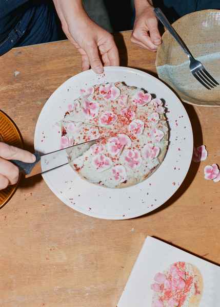 Coconut Raspberry Lime Leaf Cake KitEditorial Image of person making cake