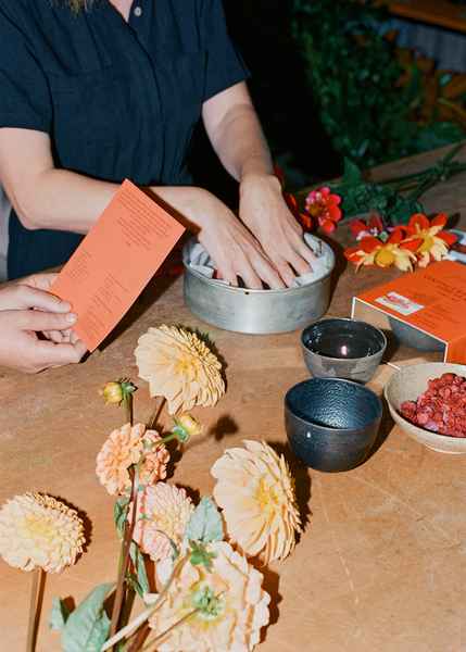 Coconut Raspberry Lime Leaf Cake KitEditorial Image of person making cake