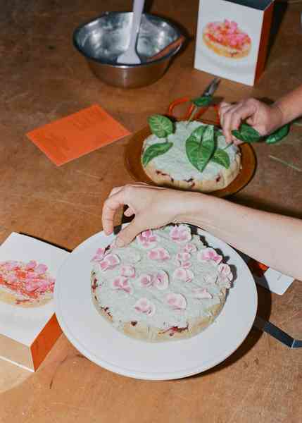 Coconut Raspberry Lime Leaf Cake KitEditorial Image  of person making cake